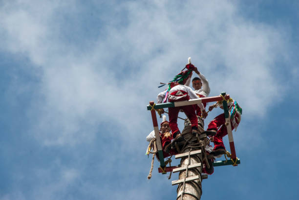 Papantla, Veracruz, México; 05 07 2022: Papantla flyers performing their act.