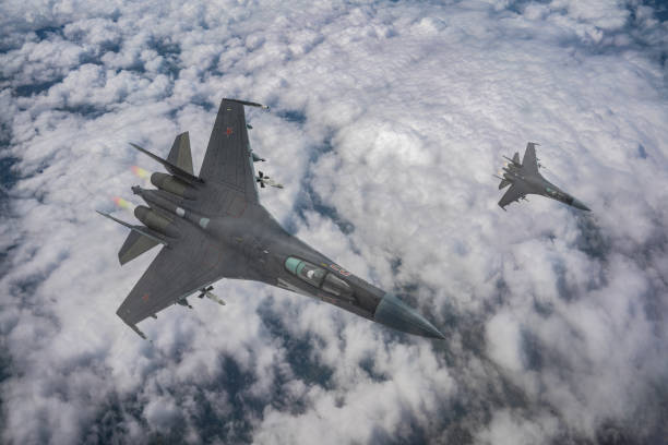 istock SU-35 Jet fighters flying over clouds. 2176728829