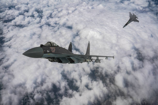 istock SU-35 Jet fighters flying over clouds. 2176731832