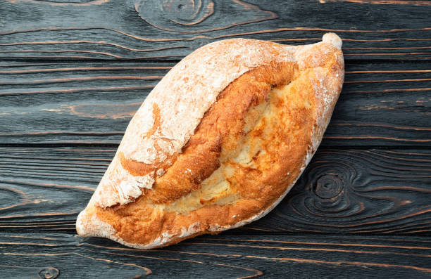 istock Loaf of  wheat hearth bread . Top view 2176732318