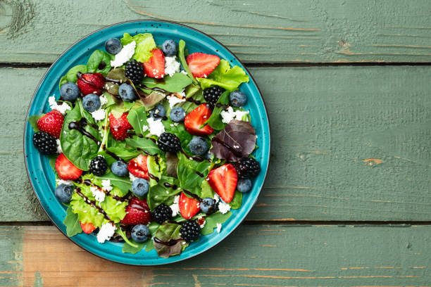 istock Berries salad (blueberry strawberry blackberry ) with cheese feta and balsamic sauce 2176732323