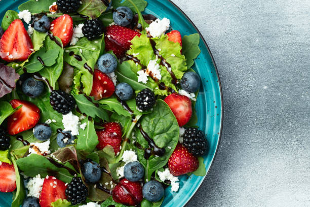 istock Berries salad (blueberry strawberry blackberry ) with cheese feta and balsamic sauce 2176732327