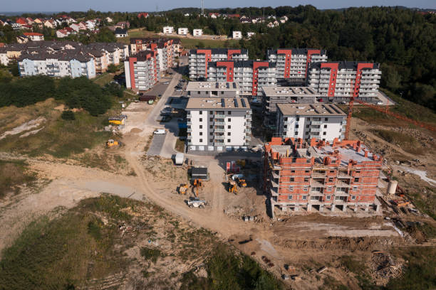 istock Apartment buildings and construction site 2176737523