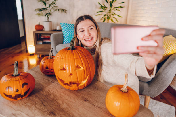 istock Woman celebrates Halloween 2176740130