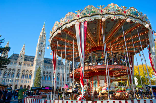 Advent time on Rathausplatz with carousel in foreground