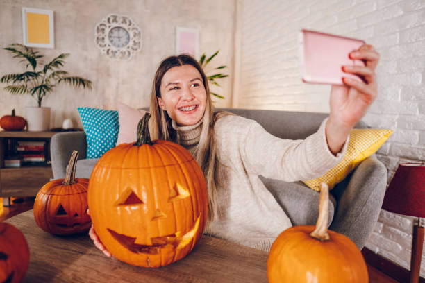 istock Woman celebrates Halloween 2176740824