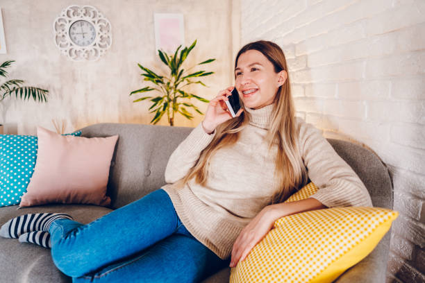 istock Woman enjoy at home while preparing Halloween 2176742360