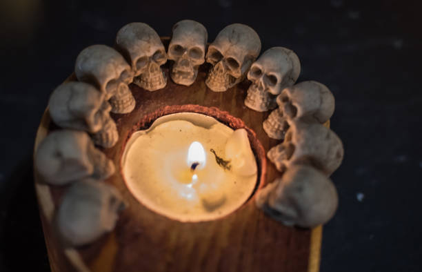 This black metal lantern with a glass panel creates a spooky, flickering glow when lit with the included candle. Its vintage, haunting design makes it a perfect Halloween decoration to set the mood.