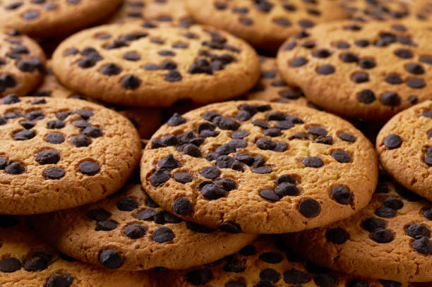 istock Chocolate chip cookies placed throughout the screen selective focus. Food background. 2176743469