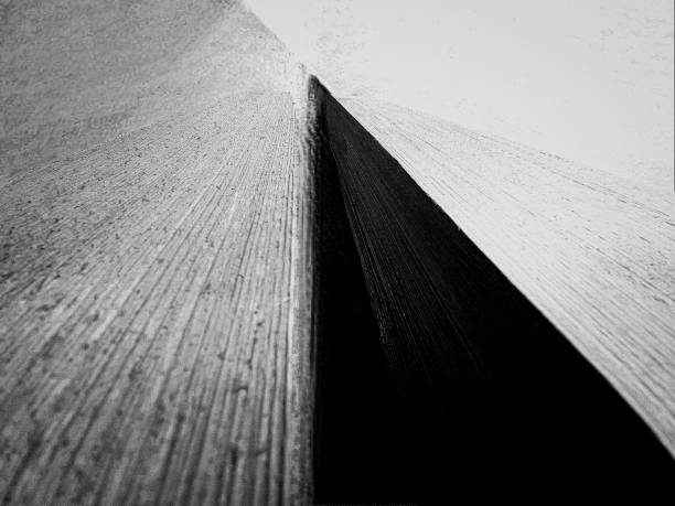 abstract towers of wood posts creative background with grain detail