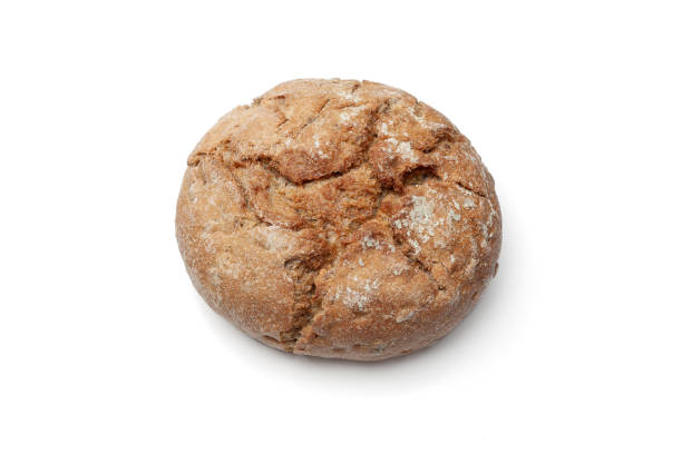 Rustic Round Loaf of Whole Grain Bread Isolated on White Background