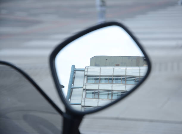 istock building reflection in bike left mirror 2176771732
