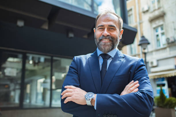 istock Middle aged businessman in the city 2176776846