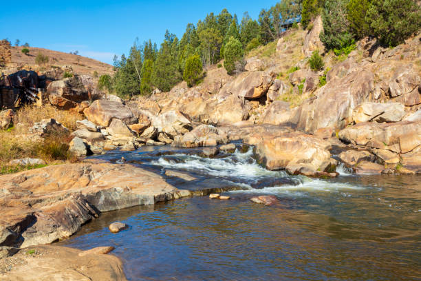 istock A tranquil stream flowing through the countryside in the Snowy Mountains 2176783311