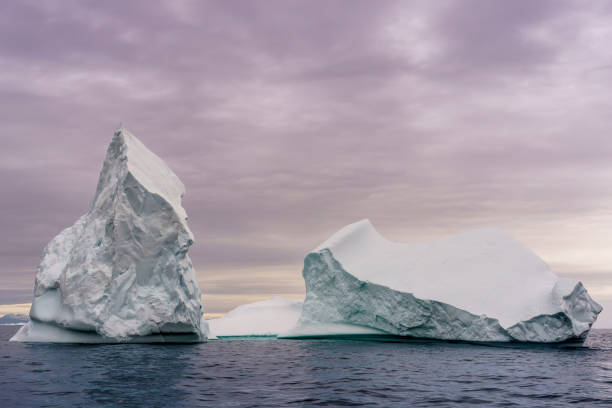 istock Two icebergs floating in Disko Bay Greenland 2176791472