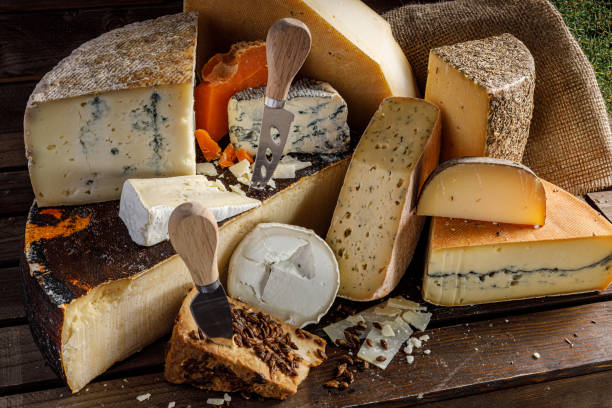 istock An Exquisite and Delicious Assortment of Artisan Cheeses Accompanied by Cutting Tools 2176800512