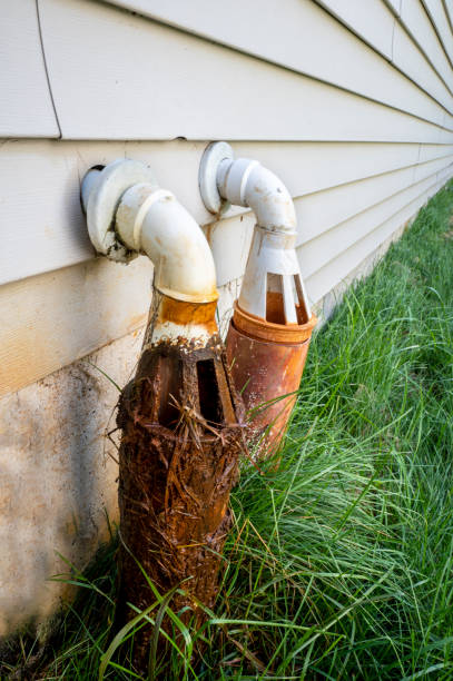 istock A basement sump pump pipes outside house 2176800531