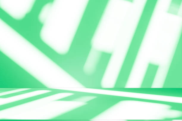istock Studio style background wall decoration presentation uses white and green tones. with shadows cast from a nearby window, concept creating a decorative 2176827895