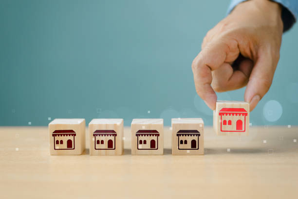 istock Franchise store expansion increase sale volume concept. Hand hold partner chart icon on cube to expand branch shop. Business development strategy market growth, SME Small medium entrepreneur invest 2176848012