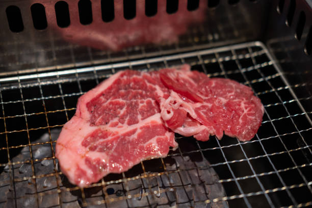 istock Korean Style Barbecue on stainless grill. BBQ rare meat with soft focus 2176863721