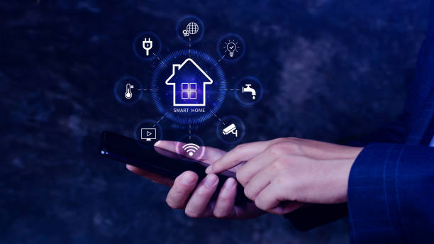 istock Smart home technology, User touches virtual screen on smartphone manage smart home features including security, lighting, temperature, Smart home and Iot concept. 2176867764
