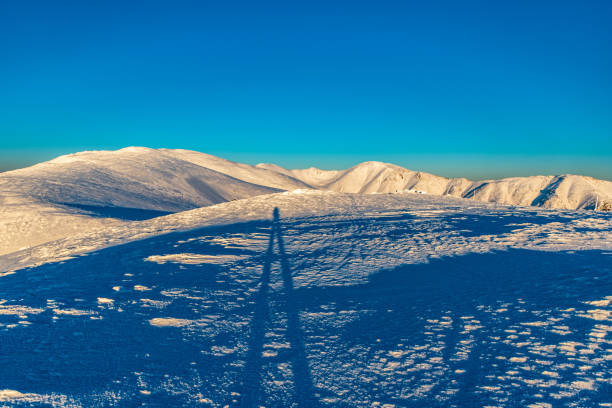 Amazing view from Durkova hill in winter Nizke Tatry mountains in Slovakia Chabenec, Kotliska, Skalka and Ziarska hola hills from Durkova hill in Nizke Tatry mountains in Slovakia during freezing winter evening durkova stock pictures, royalty-free photos & images