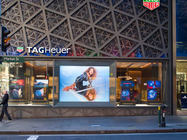 Market Street, Sydney, Australia - Jun 14 2022 : Beautifully decorated Tag Heuer store with pictures of the famous Naomi Osaka, watches and sports cars symbolizing the prestigious watch brand.