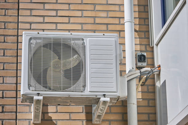 istock energy-efficient heat pump installation on a brick wall 2176873978
