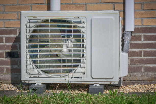 istock energy-efficient heat pump installation on a brick wall 2176873979