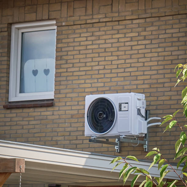istock energy-efficient heat pump installation on a brick wall 2176874168