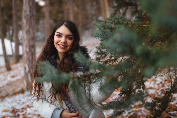 istock Beautiful woman in a public park 2176876800
