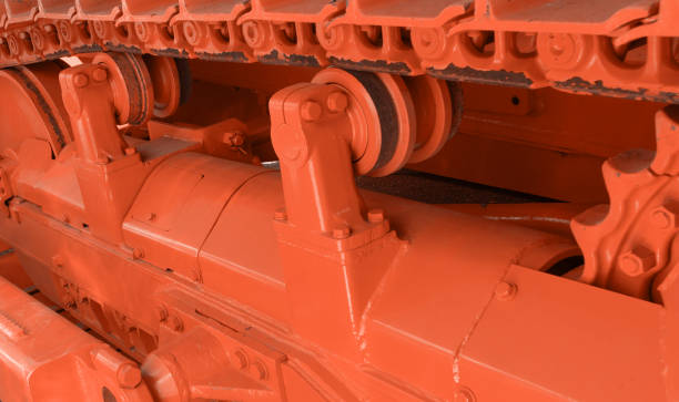 istock Modern bulldozer tracks and drive gear. Large yellow construction machine. Heavy industry equipment. Equipment for road and construction works 2176877399