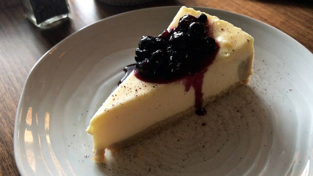 istock Homemade blueberry cheese pie on a dining table 2176878938
