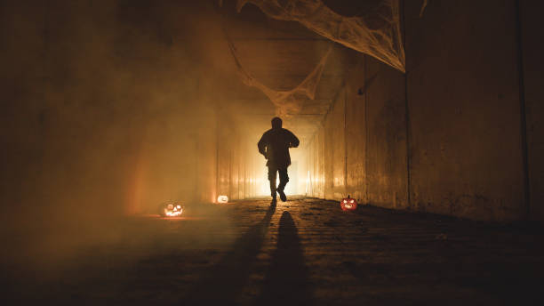 istock A Creepy Demon Running To The Light 2176879507