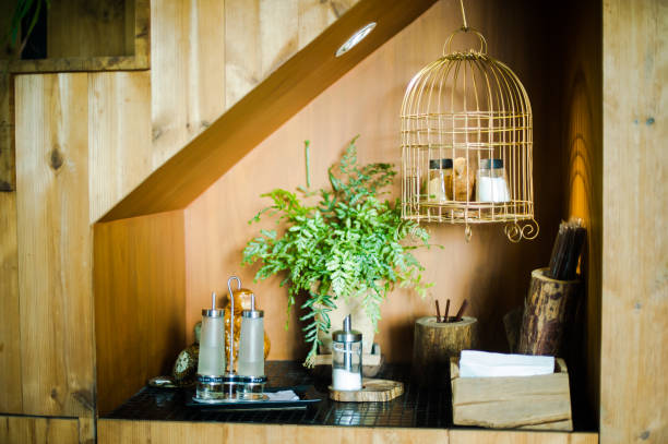 Birdcage Hanging Over Countertop At Home Birdcage Hanging Over Countertop At Home Bird cages stock pictures, royalty-free photos & images