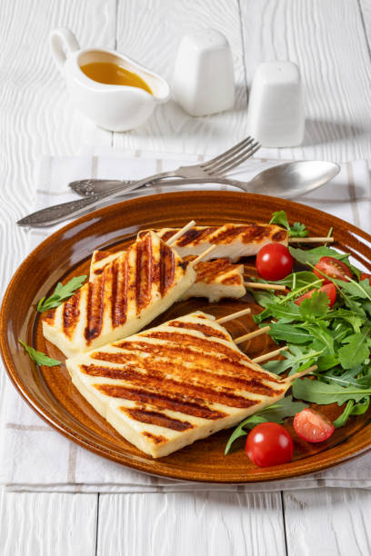 istock Grilled Greek Halloumi Cheese on sticks, top view 2176886662