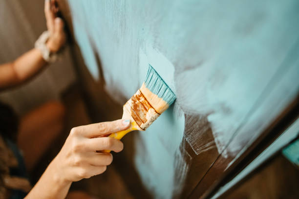 Painting with turquoise acrylic colour