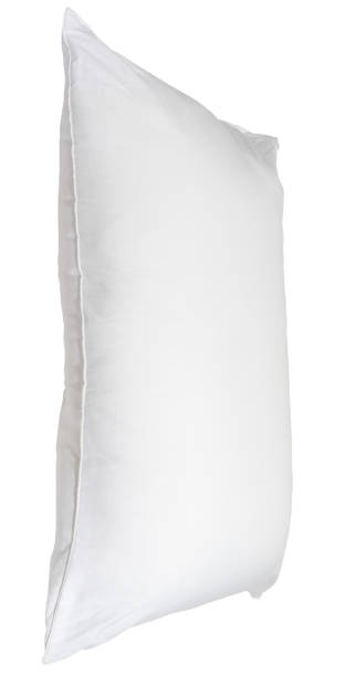 istock White pillow without case after guest's use in hotel or resort room isolated on white background with clipping path, Concept of comfortable and happy sleep in daily life 2176888253