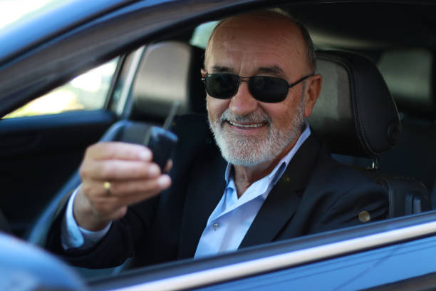 istock Senior businessman  in his new car 2176889764