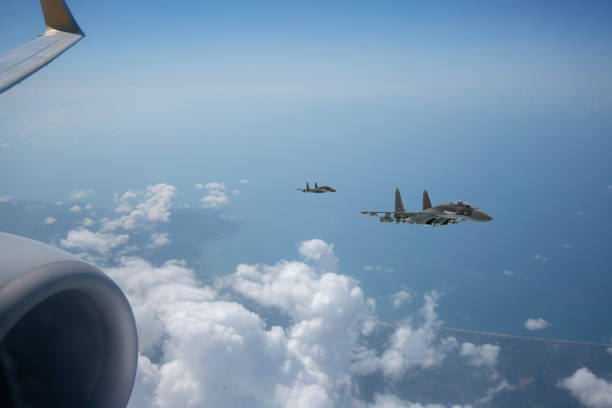 istock SU-35 Jet fighters from commercial airplane window. 2176889919