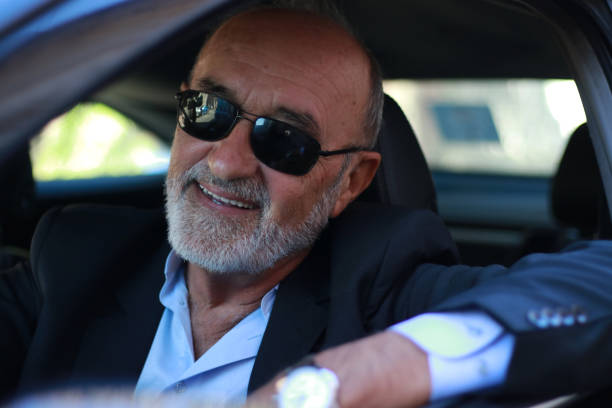 istock Senior businessman  in his new car 2176890100