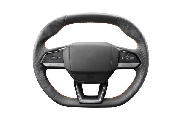 istock Modern car interior. New  modern steering wheel with media phone control buttons isolated on white background. Car interior details. Steering wheel isolated on white background 2176890509