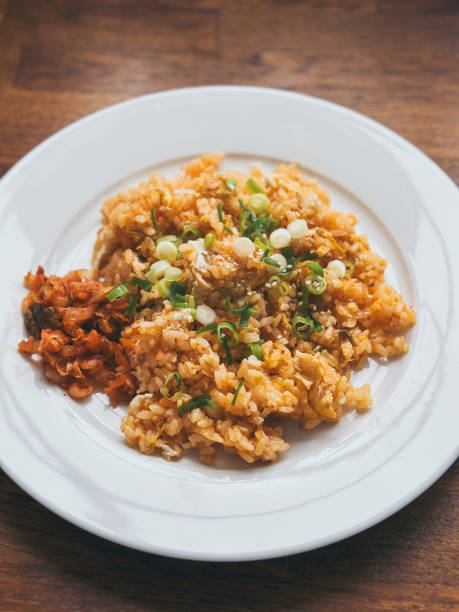 Vegetarian Kimchi-bokkeum-bap or Kimchi Fried Rice, is a popular dish in South Korea