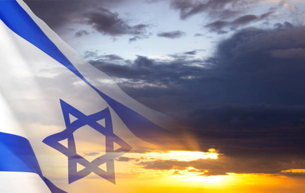istock Israel flag against the sunset 2176896067