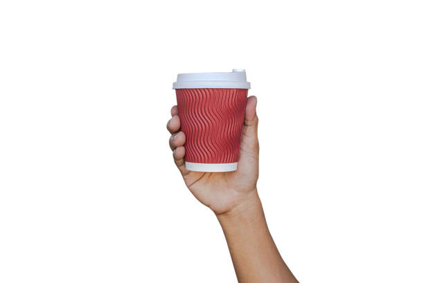 Mockup of a man's hand holding a red paper coffee cup.