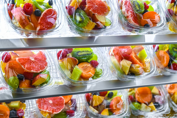istock Boxes with pre-packaged fruit salads in a commercial fridge 2176933633