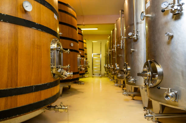 istock Wine fermentation tanks in modern wine factory 2176934766