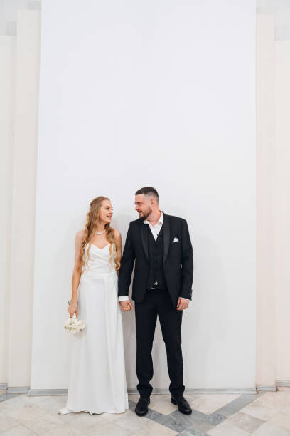istock The bride and groom ring exchanges in the Wedding Palace. 2176936919