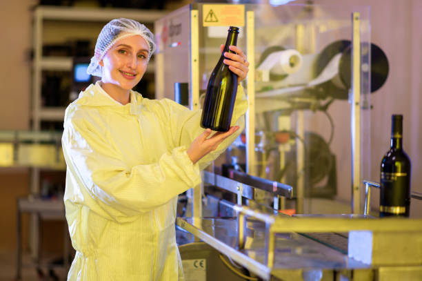 istock Professional winemaker controlling wine making process and quality at winery factory 2176937449