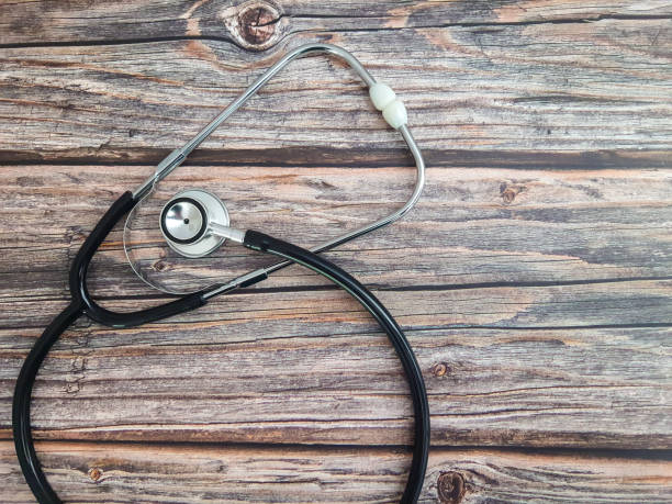 istock Stethoscope on an old wooden table 2176943016